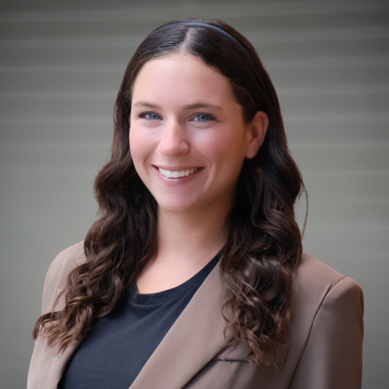 Aubrie Belinger, staff member