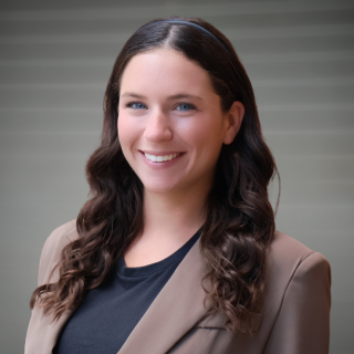 Aubrie Belinger, staff member